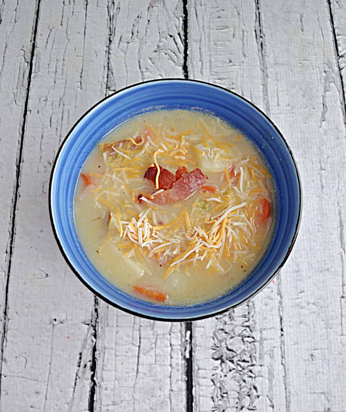A bowl of creamy potato soup.