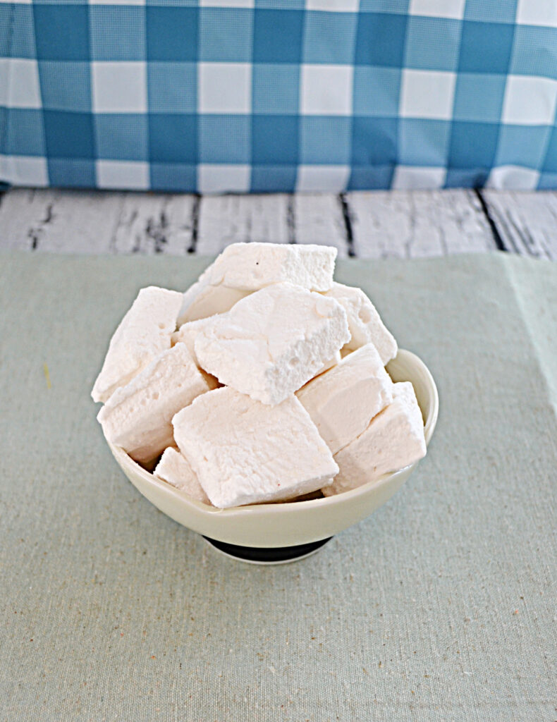 A bowl filled with soft, homemade marshmallows.