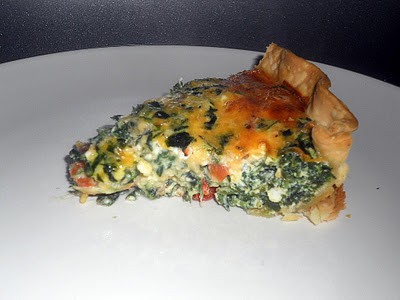 Amazing quiche filled with Spinach, Artichokes, Roasted Red Peppers, and Cheeses.