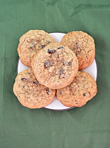 A plate of stacked Oatmeal Raisin Cookies.