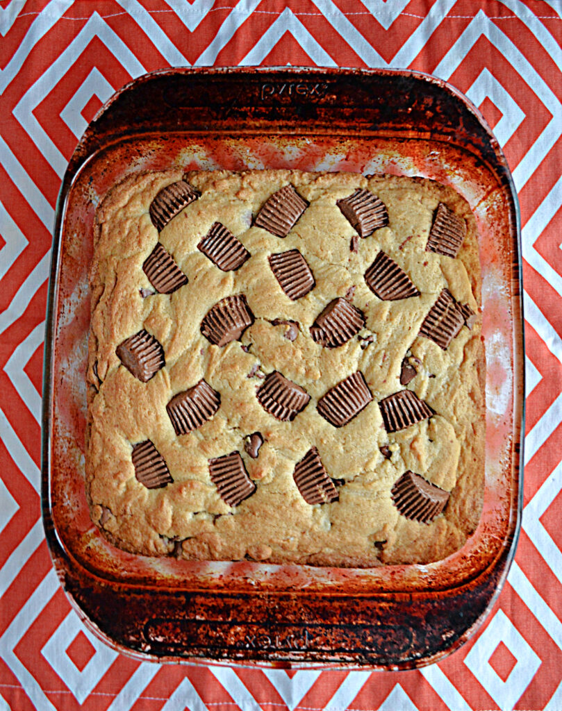 A baking dish with peanut butter cup blondies in it. 