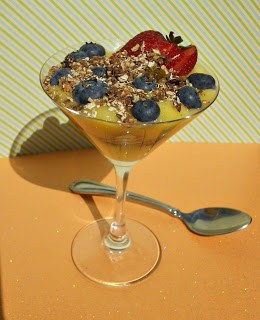 Enjoy a dish of Lemon Curd topped with Berries for breakfast