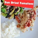 Pin Image: Title, a close up of feta and tomato chicken.
