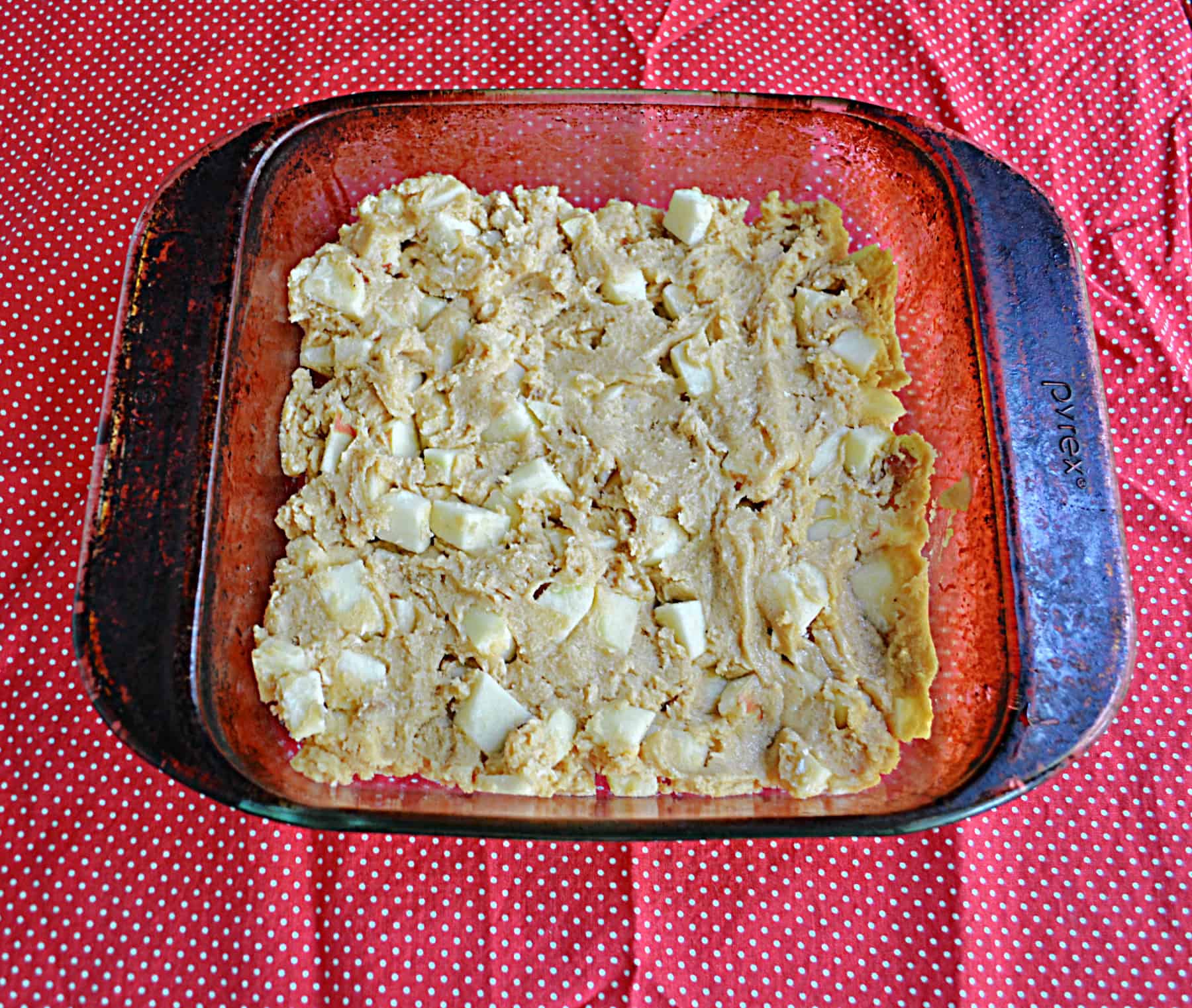 A baking dish with batter in it.