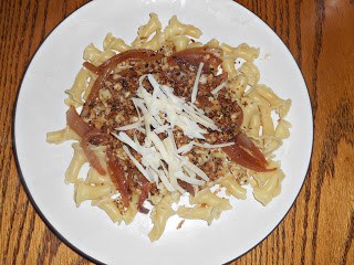 Pasta with caramelized onions, cheese, and white wine sauce
