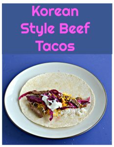 Pin Image: A plate with beef and pickled cabbage on a tortilla with text overlay.