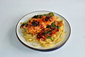 Quick and easy Italian Herb Sauteed Chicken Breasts over pasta
