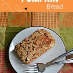 Pin Image: Title, a mini loaf of bread and two forks on a plate.