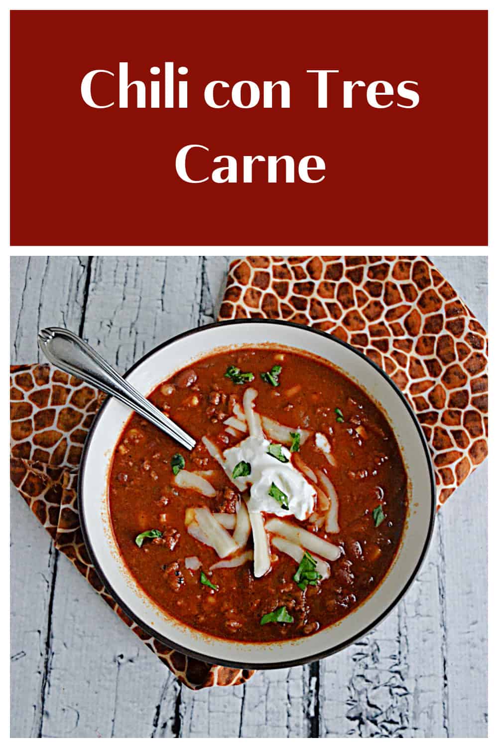 Pin Image:   Text title, a bowl of chili topped with cheese and sour cream and a spoon in the chili.