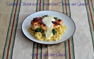 Sauteed Chicken over Caramelized Onions and Spinach with Dubliner Sauce