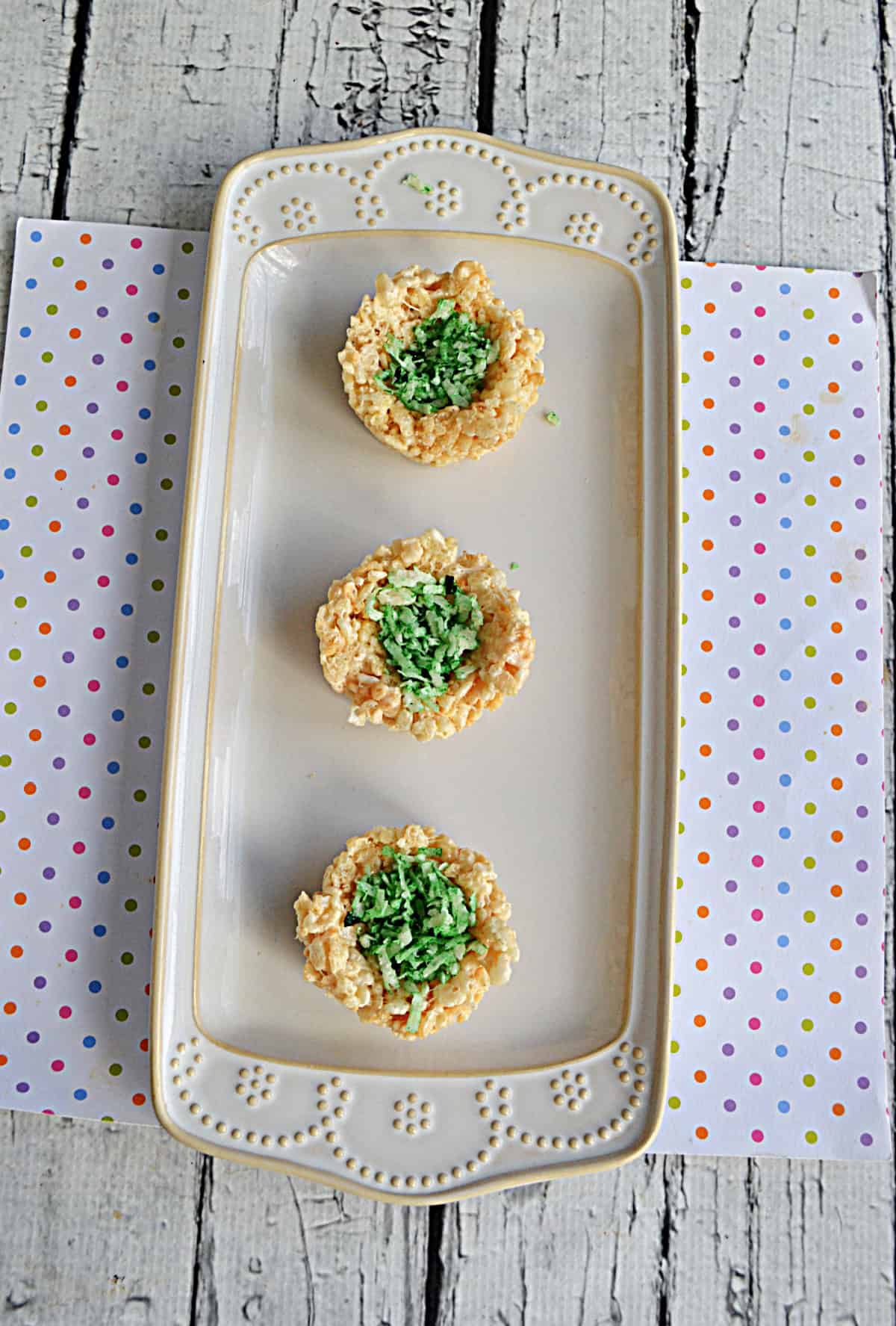 Rice Krispies treat nests topped with green coconut.