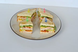 Hezzi-D Club Sandwich with turkey, cheeses, lettuce, and bacon!