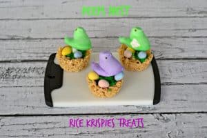 Rice Krispies treats nests with chocolate eggs and Peeps