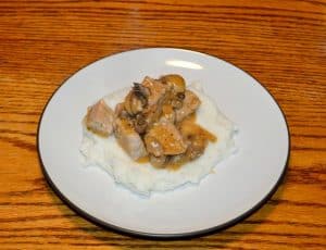 Chicken and Mushrooms in wine sauce over mashed potatoes