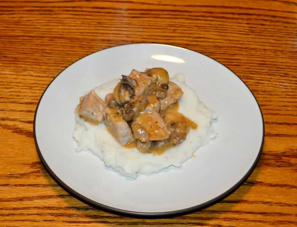 Chicken and Mushrooms in wine sauce over mashed potatoes
