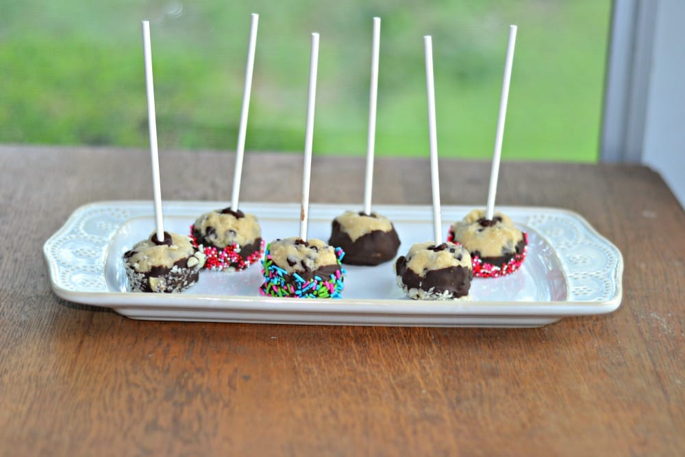 Chocolate Chipe COokie Dough Pop dipped in chocolate and rolled in jimmies, sprinkles, and nuts