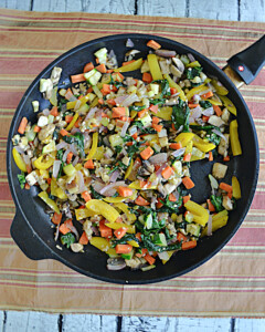 A skillet filled with colorful vegetables