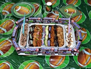 SNICKERS Sweet Snack Stadium with SNICKERS bars, SNICKERS dip, and lots of fun dippers!