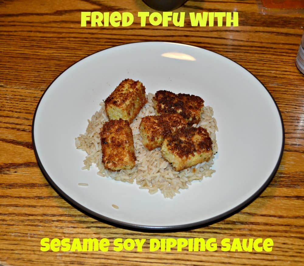 Crispy Tofu is fried to a golden brown and served with a sesame dipping sauce.