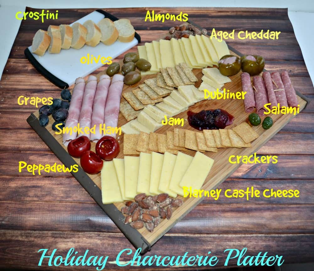 Holiday Charcuterie Platter with cured meats, cheeses, fruits, nuts, and more!