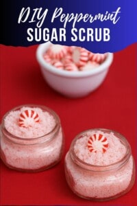 Pin Image: Title, two jars of pink sugar scrub with a bowl of peppermint candies behind the jars.