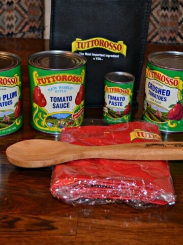 Tuttorosso Tomatoes, an apron, and a wooden spoon set!