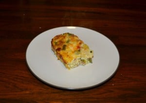 Delicious hot Breakfast Casserole with Sausage, cheese, eggs, and vegetables