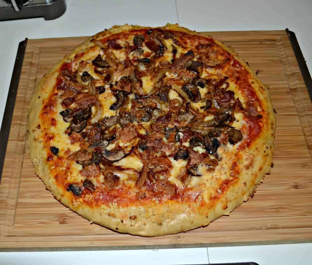 Mellow Mushroom Pizza with mushrooms, bacon, and caramelized onions