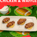 Pin Image: Title, a platter with mini waffles with wings on top and a bowl of ranch dressing in the background.
