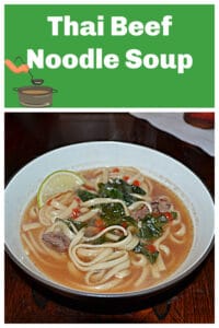Pin Image: Text, a bowl of beef noodle soup with spinach in the bowl and dots of Sriracha on top.