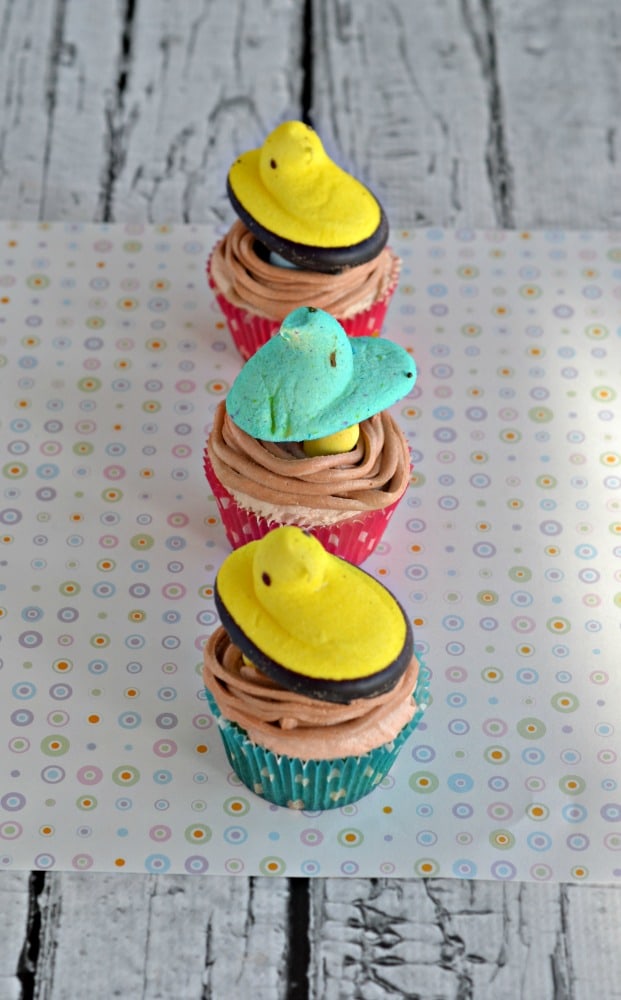 Easy to make PEEPS nest cupcakes with brown frosting nests and chocolate eggs