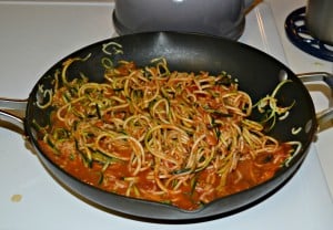 Zoodles mixed with pasta sauce is a healthy substitute for pasta marinara.