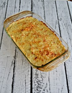 Colcannon is a traditional Irish side dish made with potatoes and cabbage and topped with Dubliner cheese