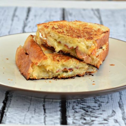 Jalapeno Popper Grilled Cheese Sandwiches are a delicious way to celebrate National Grilled Cheese Day!