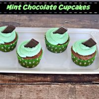 Chocolate Cupcakes with Green Mint Frosting topped with a chocolate mint!