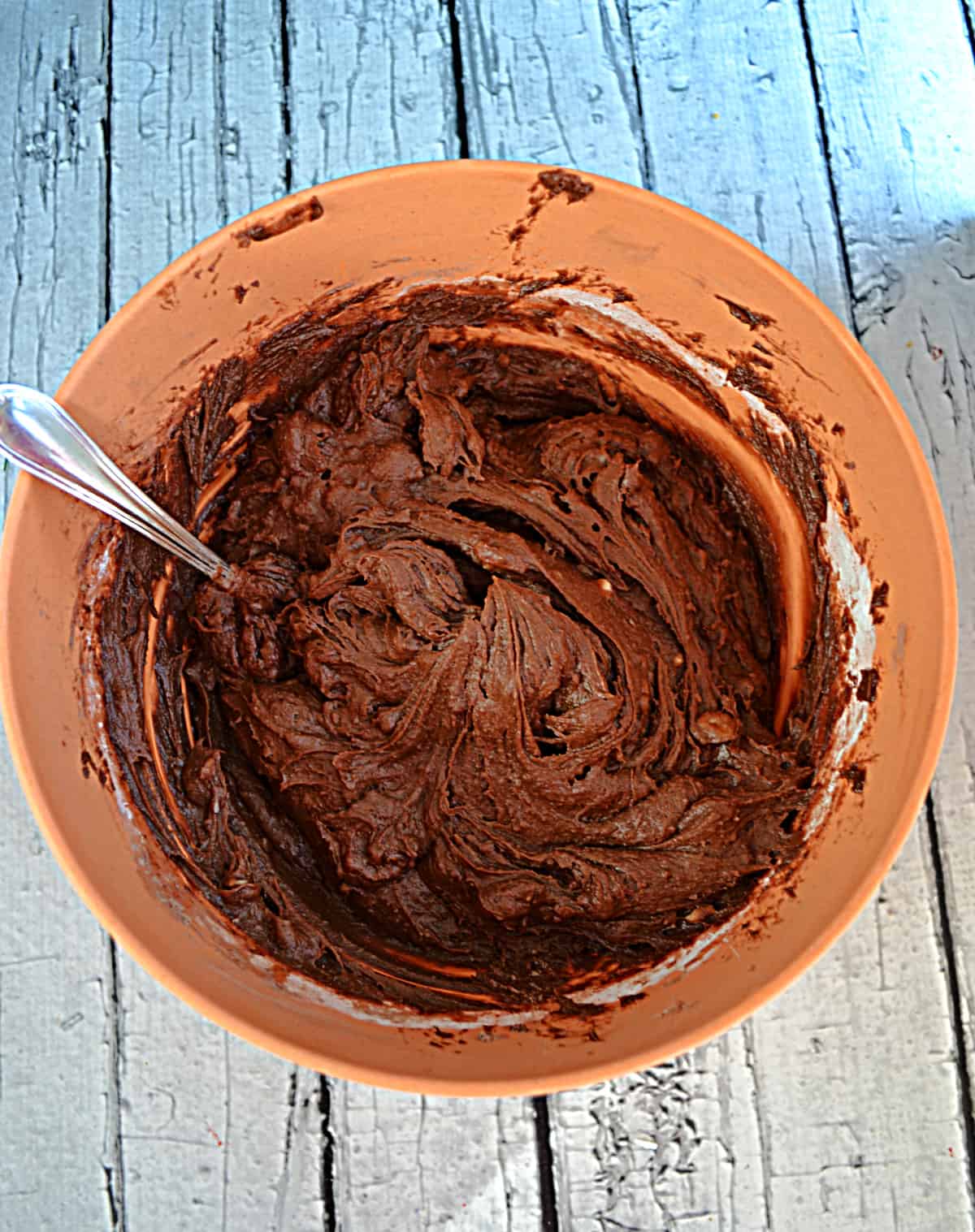 A bowl of chocolate cake batter.