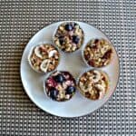 Delicious and healthy individual baked oatmeal bites with a variety of mix-ins.