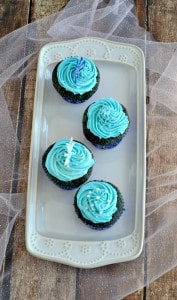 Blue Velvet Cupcakes are a delicious dessert! Add some red strawberries for a red, white, and blue treat!