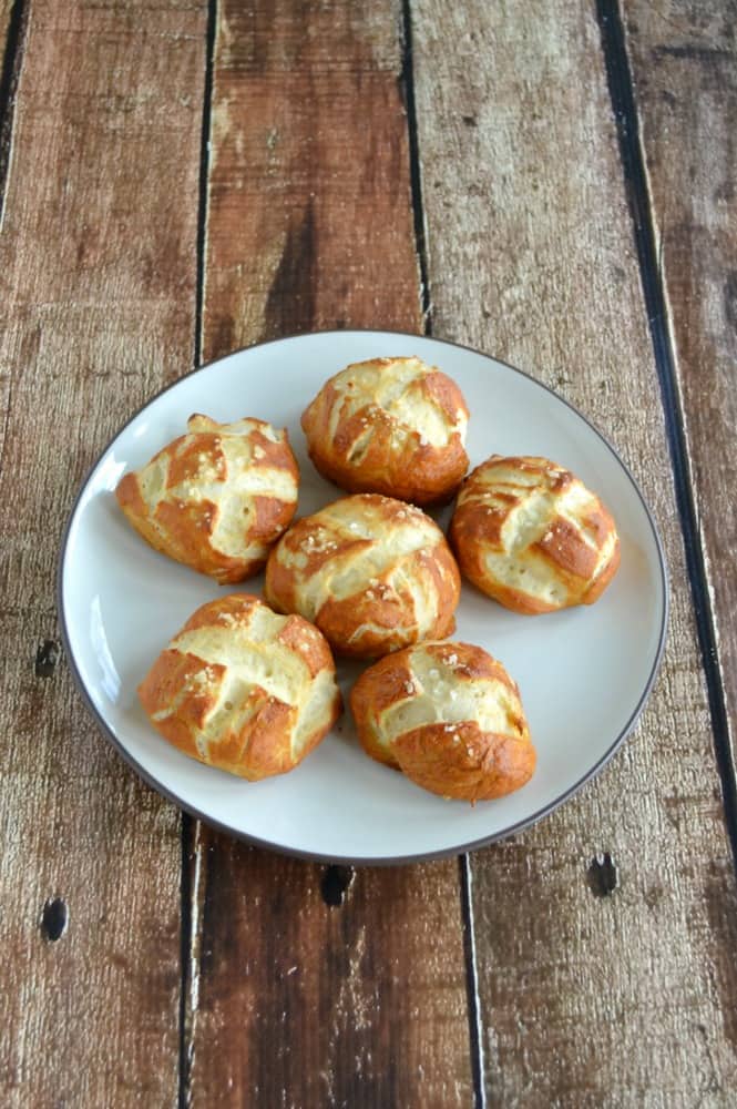 Delicious Homemade Pretzel Buns stuffed with spicy chorizo and cheddar cheese