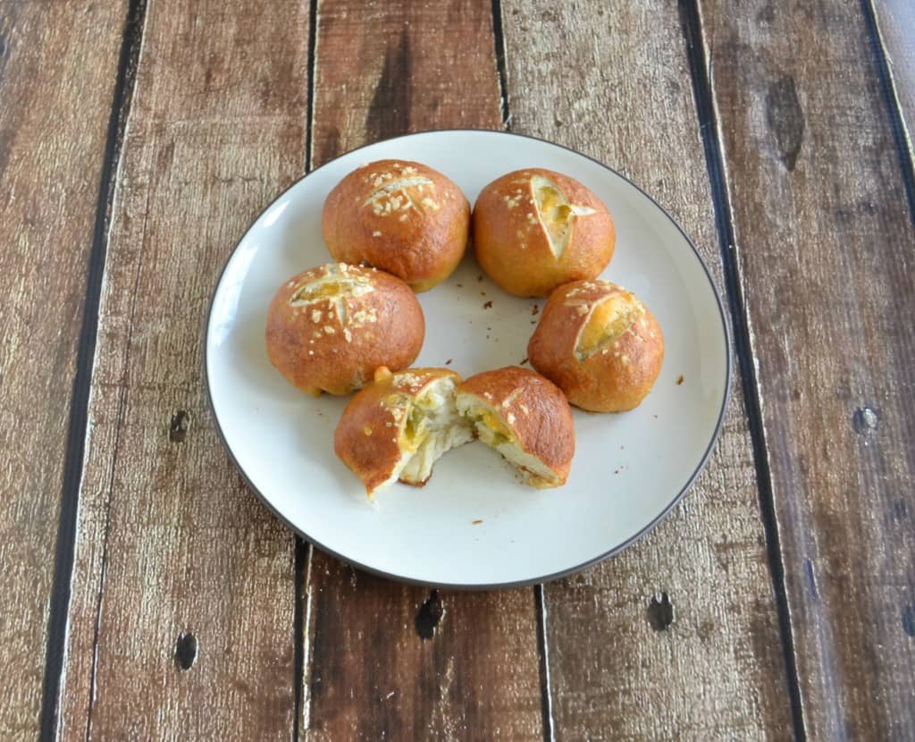 Tasty Homemade Pretzel Buns filled with chorizo cheddar cheese. A great recipe!