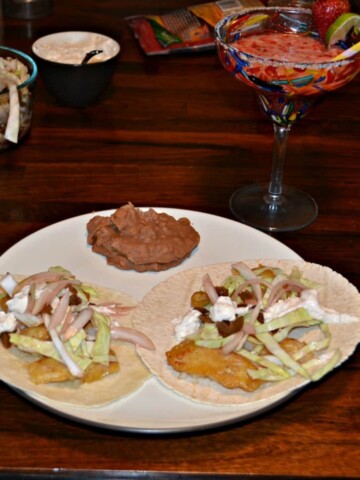 Fish Tacos with Pickled Onions and Cabbage