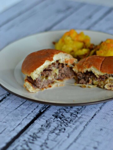 Tasty grilled burgers stuffed with jalapenos and Dubliner cheese