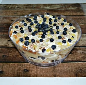 Lemon Blueberry Trifle is a tasty and easy to make dessert filled with almond cake, lemon curd, whipped frosting, and blueberries