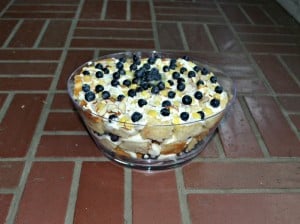 Lemon Blueberry Trifle made with layers of almond cake, homemade lemon curd, whipped frosting, and blueberries!