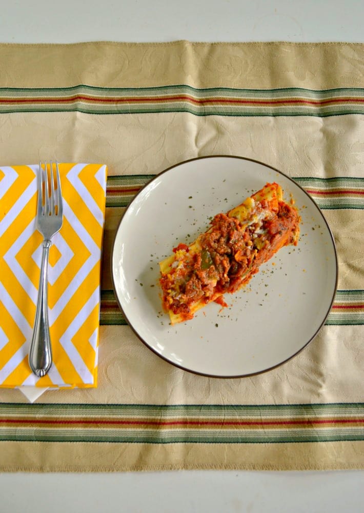Mexican Stuffed Manicotti is a delicious combination of ground beef and cheese stuffed in manicotti with a salsa sauce.