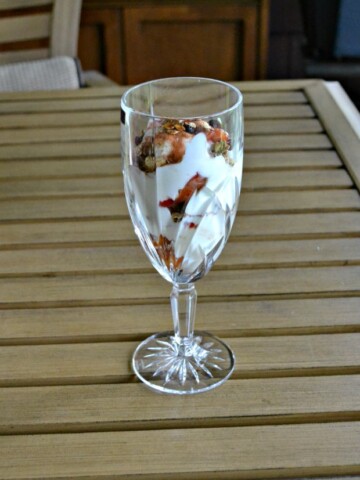 Yogurt parfaits with roasted peaches and plums and homemade granola