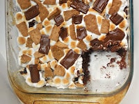 S'mores Brownies have a layer of marshmallow, graham crackers, and chocolate on top!