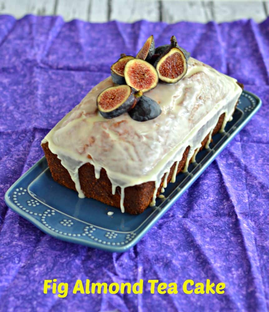 Fig Almond Tea Cake topped with white chocolate Ganache