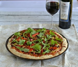 Love pizza? Then you need to make this Chorizo and Roasted Pepper Pizza with Arugula.