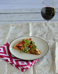 Grab a glass of Merlot with this spicy Chorizo and Roasted Pepper Pizza with Arugula